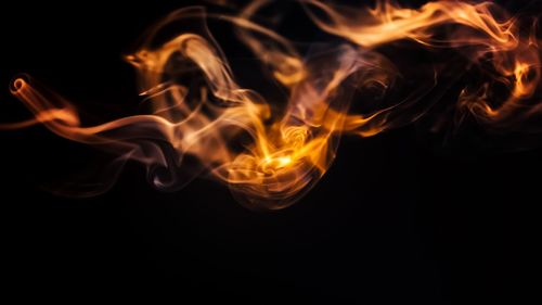 Close-up of fire against black background