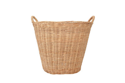 Close-up of wicker basket against white background