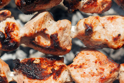 Close-up of meat on barbecue