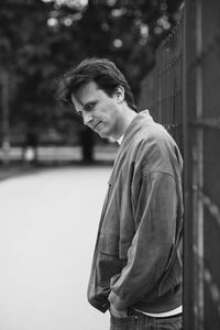 Portrait of young man standing outdoors