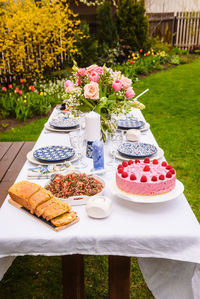 Various flowers on table