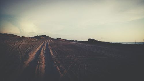 Agricultural field against sky