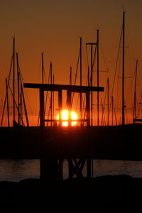 Silhouette of marina at sunset