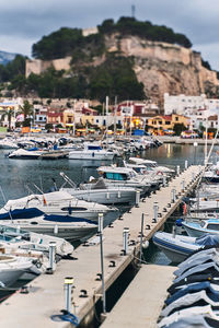 High angle view of harbor by buildings in city