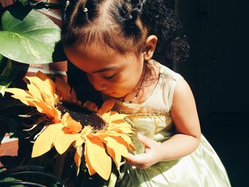 Young woman with autumn leaves