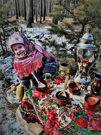 Portrait of woman in park during winter