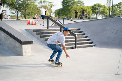 Full length of a boy skateboarding