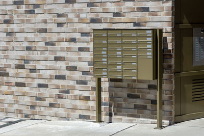 Mailboxes at the wall of building in rostock, entrance 