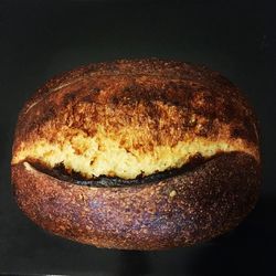 High angle view of bread against black background