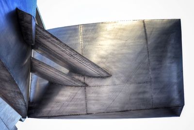 Low angle view of metallic structure against sky