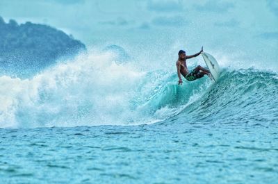 Man surfing in sea