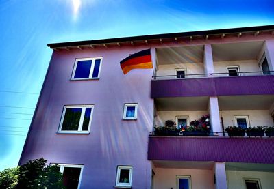 Low angle view of building against blue sky