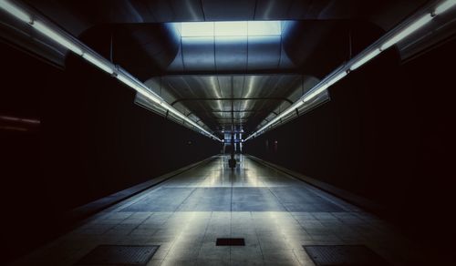 Interior of illuminated underground railroad station