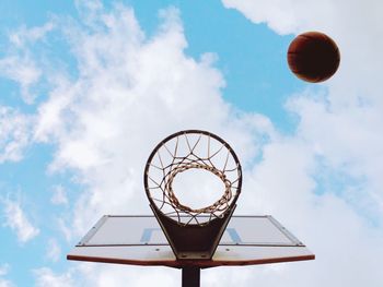 Low angle view of basketball hoop against sky