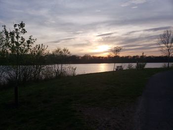 Scenic view of lake against sky during sunset