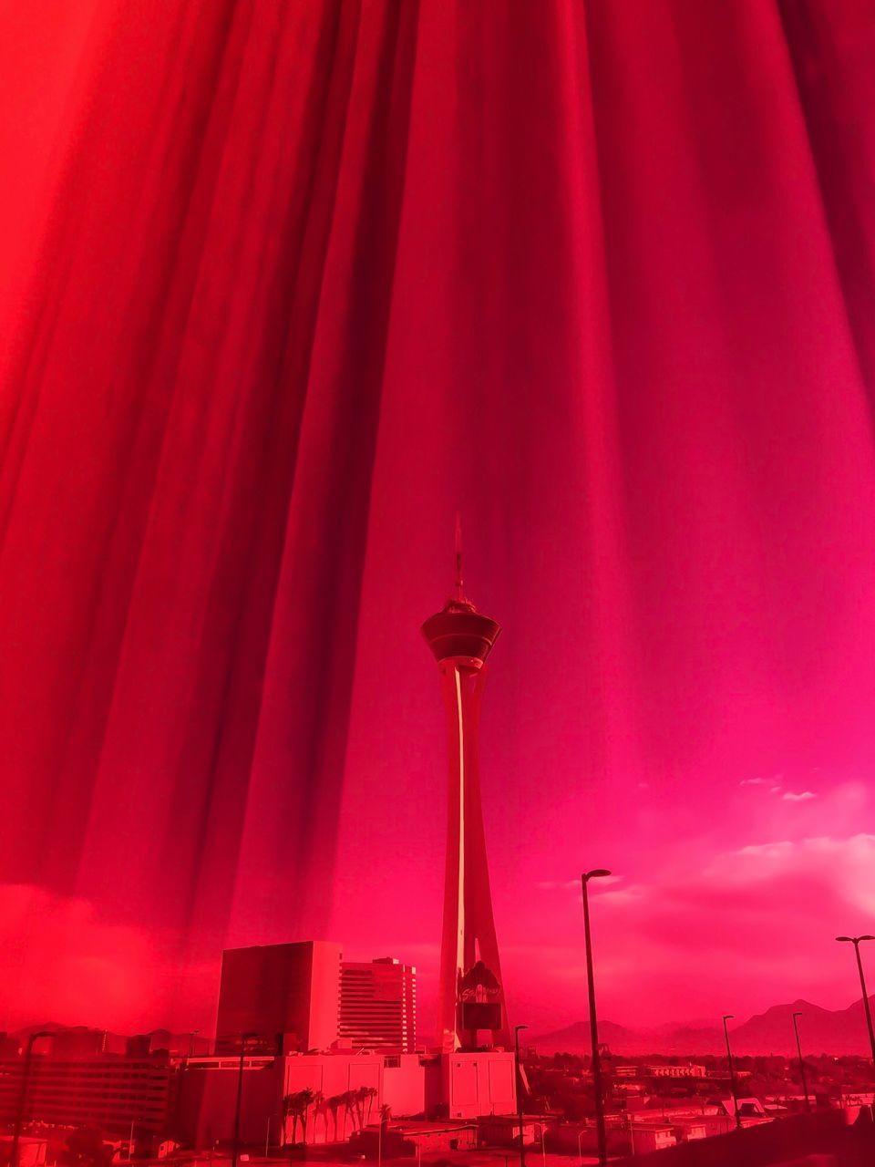 LOW ANGLE VIEW OF RED TOWER AGAINST SKY