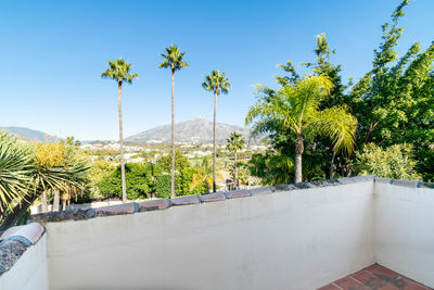 A view from a villa balcony overlooking the mountain peaks surrounding marbella