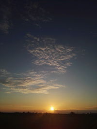 Scenic view of silhouette landscape against sky during sunset