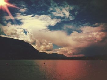 Scenic view of sea against cloudy sky