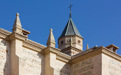 Low angle view of building against blue sky