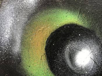 Close-up of wet illuminated at night