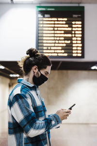 Young man using mobile phone