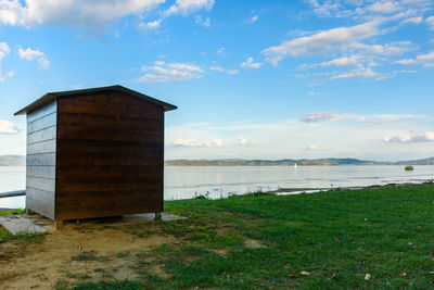 Built structure on beach against sky