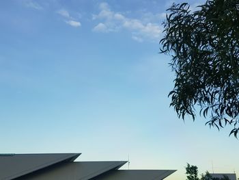 Low angle view of building against blue sky