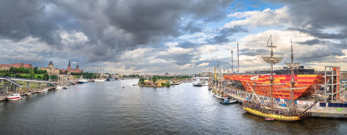 Boats in sea against sky
