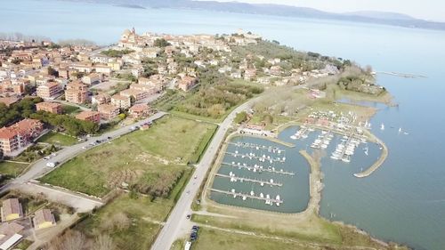 High angle view of town by sea