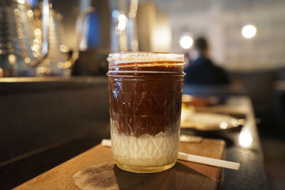 Close up glass of iced chocolate with milk