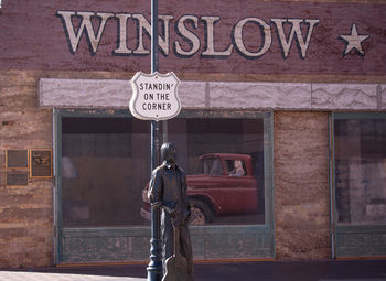 Information sign on brick wall