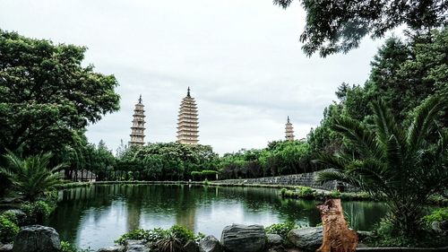 Three pagodas of chongsheng temple in china viewed from pond side