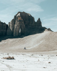 Scenic view of rocky mountains against sky