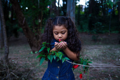 Portrait of cute girl in forest