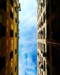 Low angle view of skyscraper against sky