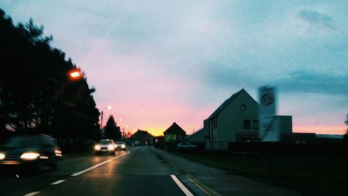 Cars on road at night