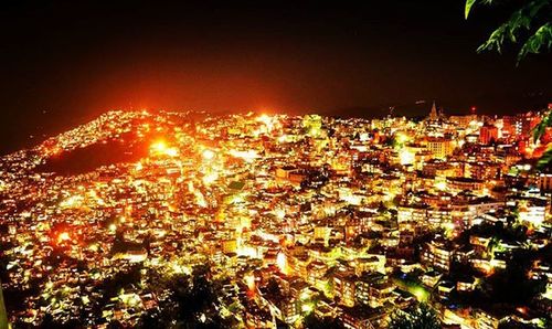 Illuminated city at night