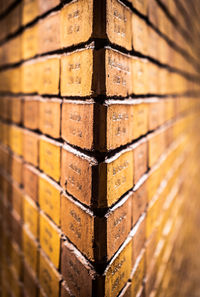 Holocaust memorial - names inscribed on brick wall. ideal for historical and educational projects.