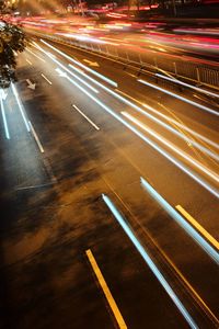 High angle view of light trails on city street