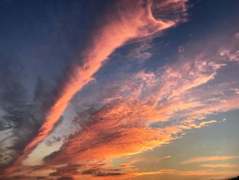 Low angle view of dramatic sky during sunset