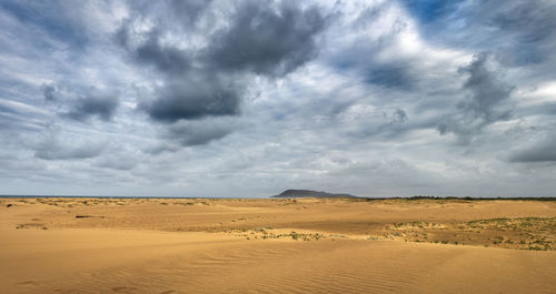 Scenic view of desert against sky