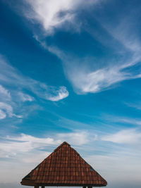 Low angle view of roof against sky