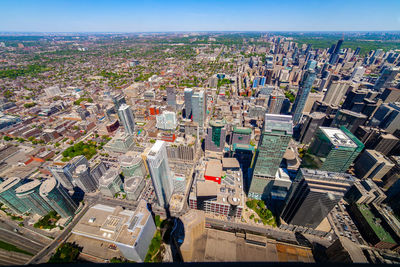 High angle view of city buildings against clear sky