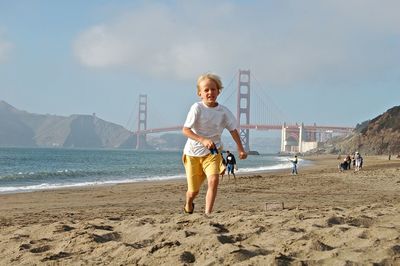 Woman standing on beach