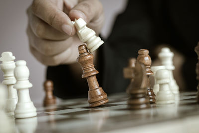 Low angle view of man playing chess