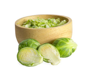 High angle view of vegetables in bowl against white background