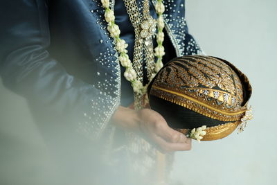 Close-up of woman holding ball
