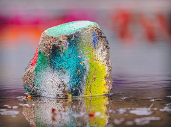 Close-up of multi colored water on lake
