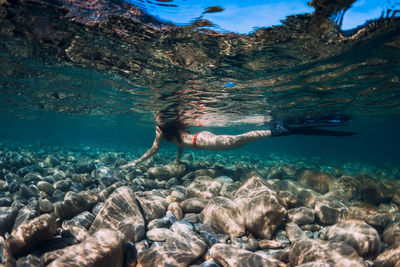 Man swimming in sea